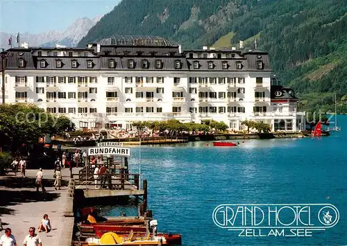 AK / Ansichtskarte Zell_See Grand Hotel Uferpromenade Bootsanleger Rundfahrten Zell_See