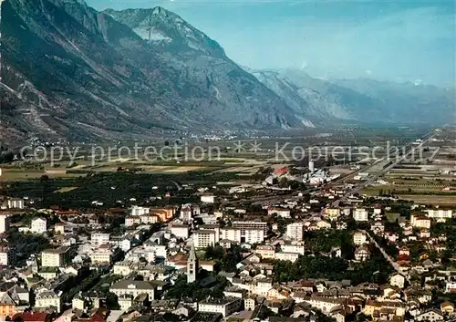 AK / Ansichtskarte Martigny_VS La Ville vue d avion et la Vallee du Rhone Martigny VS