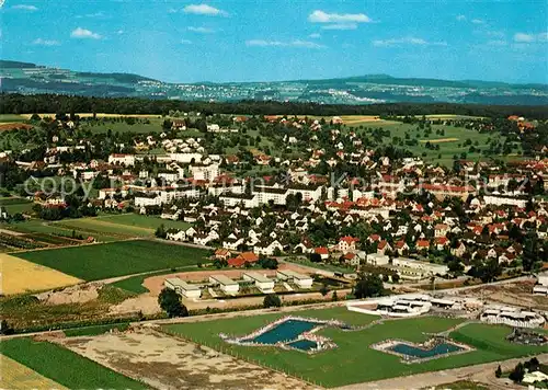 AK / Ansichtskarte Wohlen_AG mit Schwimmbad Fliegeraufnahme Wohlen_AG