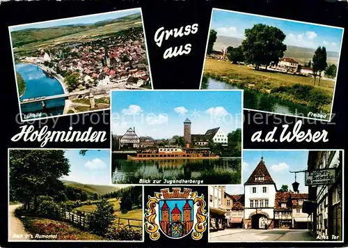 AK / Ansichtskarte Holzminden_Weser Fliegeraufnahme Freibad Jugendherberge Rumortal Altes Tor Holzminden Weser