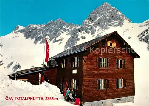 AK / Ansichtskarte Vandans_Vorarlberg Totalphuette Berghuette Luenersee gegen Schesaplana im Winter Vandans Vorarlberg