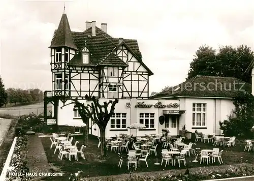 AK / Ansichtskarte Schwalbach_Taunus Hotel Haus Charlotte Terrasse Fachwerkhaus Schwalbach Taunus