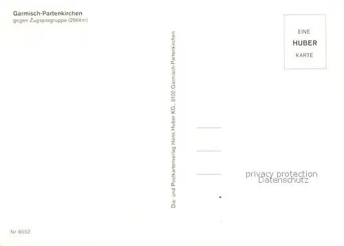 AK / Ansichtskarte Garmisch Partenkirchen Ortsmotiv mit Kirche Blick gegen Zugspitzgruppe Wettersteingebirge Huber Karte Nr 8552 Garmisch Partenkirchen