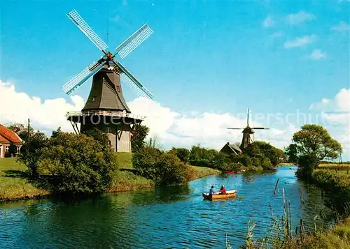 AK / Ansichtskarte Greetsiel Zwillingsmuehlen am Kanal Greetsiel