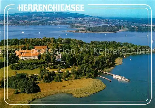 AK / Ansichtskarte Herrenchiemsee Benediktinerkloster mit Schloss von Koenig Ludwig II Herrenchiemsee