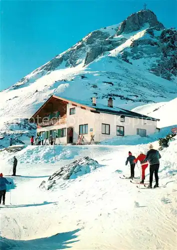 AK / Ansichtskarte Lermoos_Tirol Grugsteinhaus mit Grubigstein Berghaus Wintersportplatz Alpen Lermoos Tirol