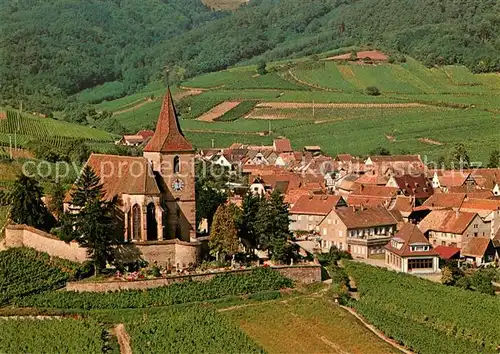 AK / Ansichtskarte Hunawihr_Hunaweier Eglise fortifiee du XIV siecle au milieu du vignoble vue aerienne Hunawihr Hunaweier