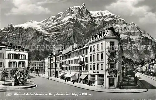 AK / Ansichtskarte Glarus_GL Bahnhofstrasse und Burgstrasse mit Wiggis Glarus_GL