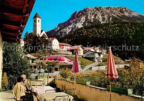 AK / Ansichtskarte Graun Gasthaus Goldener Adler Kirche Graun