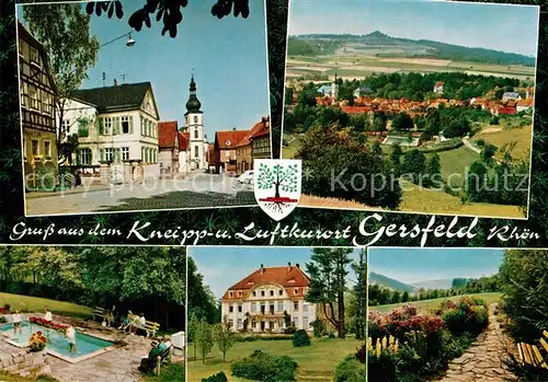 AK / Ansichtskarte Gersfeld_Rhoen Ortsmotiv mit Kirche Panorama Kurort Kurpark Kurhaus Wassertreten Gersfeld Rhoen