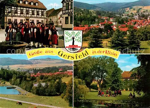AK / Ansichtskarte Gersfeld_Rhoen Trachtengruppe Panorama Kurort Wappen Gersfeld Rhoen