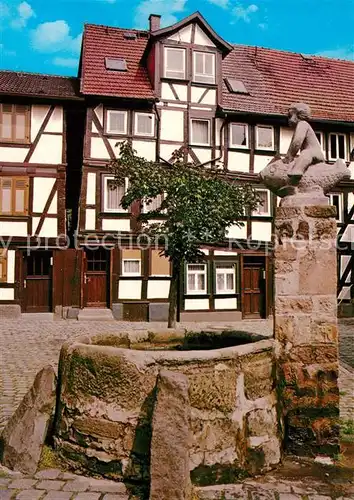 AK / Ansichtskarte Alsfeld Grabbrunnen Fachwerkhaus Altstadt Alsfeld