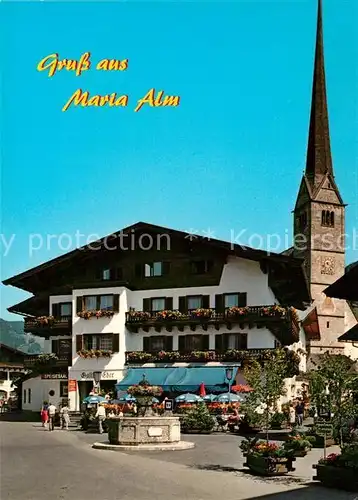 AK / Ansichtskarte Maria_Alm_Steinernen_Meer Hauptplatz mit Fussgaengerzone und Kirche Maria_Alm_Steinernen_Meer