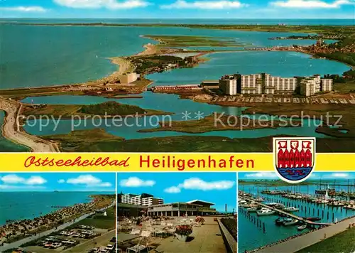 AK / Ansichtskarte Heiligenhafen_Ostseebad Hafen Hotelanlagen Restaurant Strand Fliegeraufnahme Heiligenhafen_Ostseebad