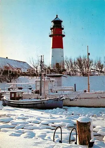 AK / Ansichtskarte Buesum_Nordseebad Leuchtturm Hafen Winter Buesum_Nordseebad