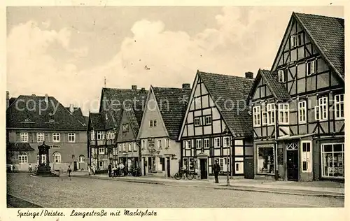 AK / Ansichtskarte Springe_Deister Langestrasse mit Marktplatz Fachwerkhaeuser Springe_Deister