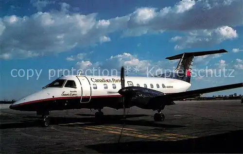 AK / Ansichtskarte Flugzeuge_Zivil Ontario Express Canadian Partner Embraer 120RT Brazilia C GDOE Flugzeuge Zivil