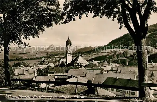 AK / Ansichtskarte Nesselwang Ortsansicht mit Kirche Hoehenluftkurort Alpenblick Nesselwang