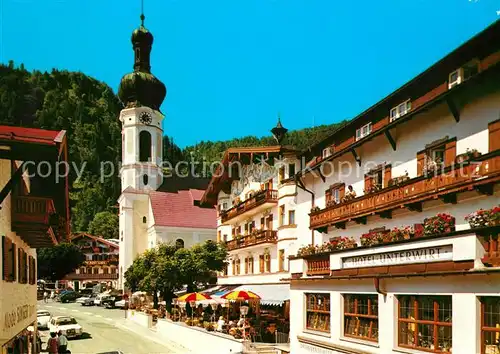 AK / Ansichtskarte Reit_Winkl Dorfpartie mit Kirche Hotel Unterwirt Huber Karte Nr 8592 Reit_Winkl
