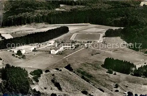 AK / Ansichtskarte Gruenberg_Hessen Fliegeraufnahme Sportschule Gruenberg Hessen