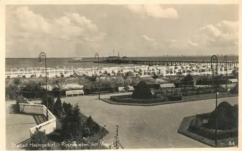 AK / Ansichtskarte Heringsdorf_Ostseebad_Usedom Rosengarten mit Strand Heringsdorf_Ostseebad