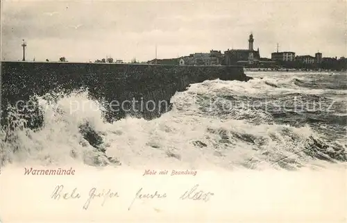 AK / Ansichtskarte Warnemuende_Ostseebad Mole mit Brandung Warnemuende_Ostseebad