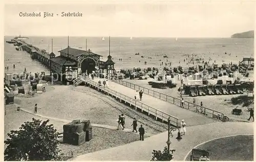 AK / Ansichtskarte Binz_Ruegen Promenade Strand Seebruecke Binz_Ruegen