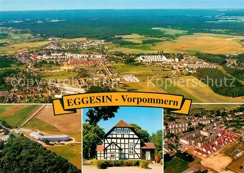 AK / Ansichtskarte Eggesin Fliegeraufnahme Hotel Stadt Eggesin Fachwerkkirche Wohngebiet  Eggesin