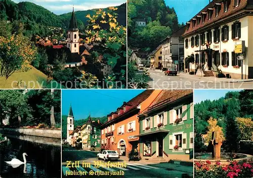 AK / Ansichtskarte Zell_Wiesental Ortsansicht mit Kirche Hauptstrasse Schwanenteich Brunnen Erholungsgebiet Zeller Bergland Schwarzwald Zell Wiesental