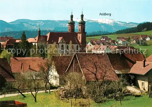AK / Ansichtskarte St_Peter_Schwarzwald Ortsansicht mit Kirche Blick zum Feldberg St_Peter_Schwarzwald