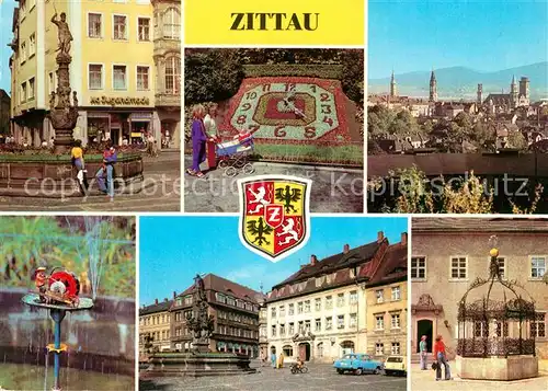 AK / Ansichtskarte Zittau Rolandbrunnen Blumenuhr Teilansicht Schleifermaennchen August Bebel Platz Herkulesbrunnen Gruener Born Stadtmuseum Wappen Zittau