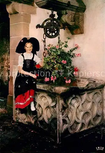 AK / Ansichtskarte Mittelbergheim Alsacienne au puits Mittelbergheim