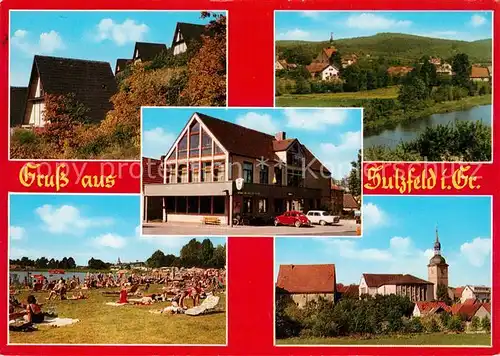 AK / Ansichtskarte Sulzfeld_Grabfeld Ferienhaeuser Hotel Liegewiese am Badesee Ortsmotiv mit Kirche Partie am Fluss Sulzfeld Grabfeld