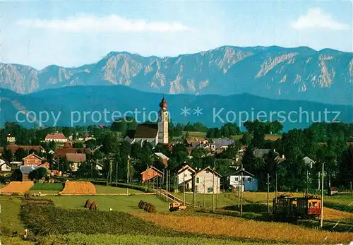 AK / Ansichtskarte St_Georgen_Attergau Ortsansicht mit Kirche Alpenpanorama Hoellengebirge St_Georgen_Attergau