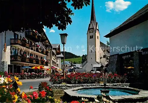 AK / Ansichtskarte Abtenau Ortsmotiv mit Kirche Brunnen Sommerfrische Abtenau