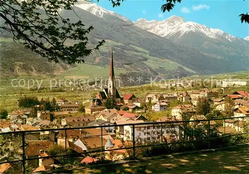 AK / Ansichtskarte Schlanders_Suedtirol Ortsansicht mit Kirche Landschaftspanorama Vinschgau Alpen Schlanders_Suedtirol