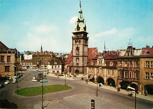 AK / Ansichtskarte Chomutov Namesti 1. maje starym kostelem Chomutov