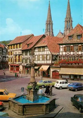 AK / Ansichtskarte Obernai_Bas_Rhin Marktplatz Brunnen Fachwerkhaeuser Altstadt Kirchtuerme Collection l Alsace pittoresque Obernai_Bas_Rhin