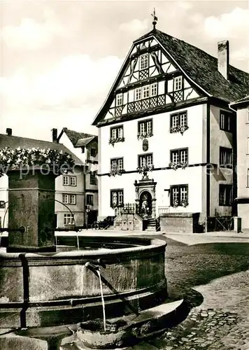 AK / Ansichtskarte Rotenburg_Fulda Rathaus mit Kump Brunnen Rotenburg Fulda