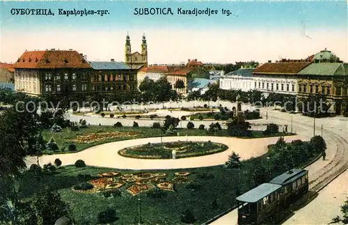 AK / Ansichtskarte Subotica Karadjordjev trg Platz Denkmal Strassenbahn Subotica