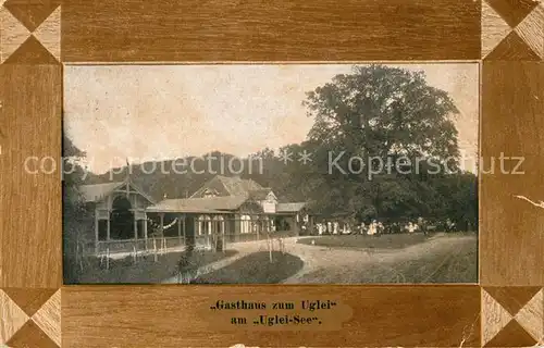 AK / Ansichtskarte Eutin Historisches Gasthaus zum Uglei am Ugleisee 600jaehrige Rieseneiche Bilderrahmen Eutin