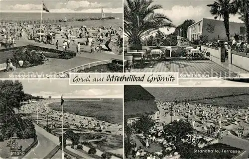 AK / Ansichtskarte Groemitz_Ostseebad Strand Seebruecke Kurmittelhaus Strandhalle  Groemitz_Ostseebad