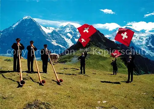 AK / Ansichtskarte Alphorn Alphornblaeser Fahnenschwinger Eiger Moench Jungfrau Alphorn