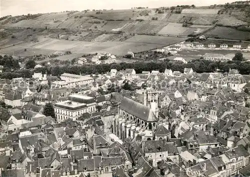AK / Ansichtskarte Joigny_Yonne Vue aerienne sur lEglise St Thibault la caisse dEspargne et le College Joigny Yonne