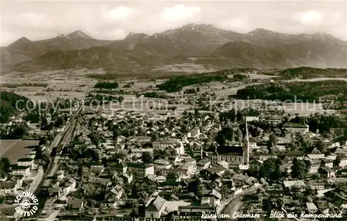 AK / Ansichtskarte Prien_Chiemsee Fliegeraufnahme mit Kampenwand Prien Chiemsee