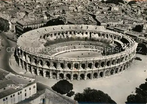 AK / Ansichtskarte Nimes Fliegeraufnahme Les Arenes Romaines Nimes