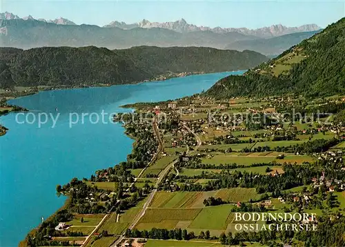 AK / Ansichtskarte Bodensdorf_Ossiacher_See Fliegeraufnahme mit Julische Alpen Bodensdorf_Ossiacher_See
