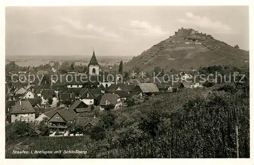 AK / Ansichtskarte Staufen_Breisgau Ortsansicht mit Kirche Fauststadt Blick zur Burg Staufen Breisgau