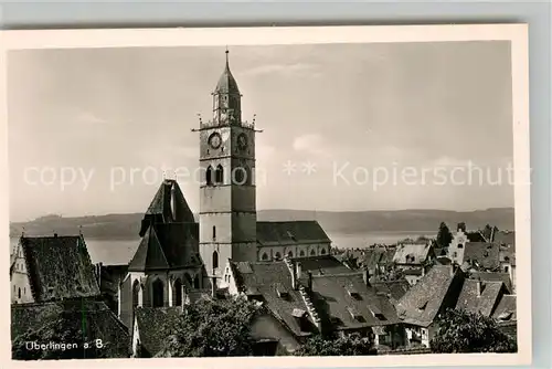 AK / Ansichtskarte ueberlingen_Bodensee Stadtbild mit Kirche ueberlingen Bodensee