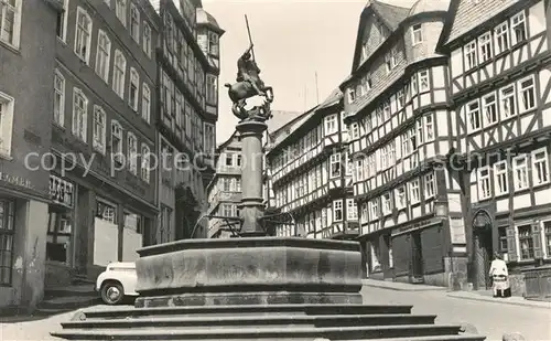 AK / Ansichtskarte Marburg_Lahn Marktbrunnen Fachwerkhaeuser Marburg_Lahn